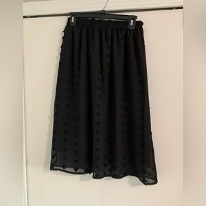 Black skirt with Pom Pom detail. Size small. NWOT